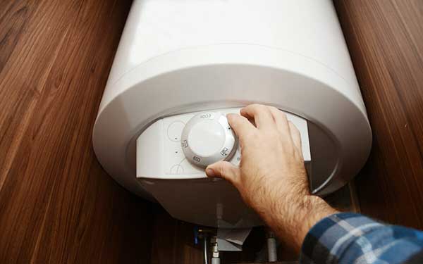 Net Zero Emissions | image of adjusting meter