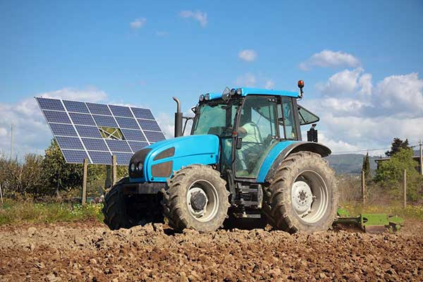 Solar Energy Next to Tractor