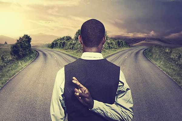 Rising Global Energy Demands | Man at 2 roads image