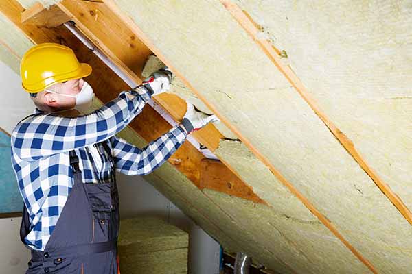 Worker Repairing Building Emission