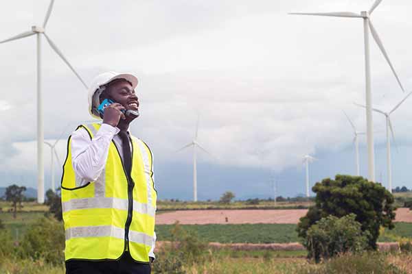 Renewable Energy Investors Image of Man on Phone
