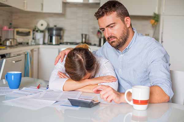 Weatherization Assistance Program | Photo Couple Looking to Upgrade Weatherization