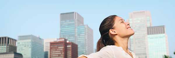 Good Neighbors Cross State Emissions Photo of Lady Smiling in Sun