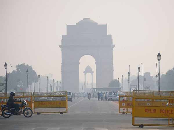 India Pollution Conflicts with Solar Power Photo of Pollution over Bridge