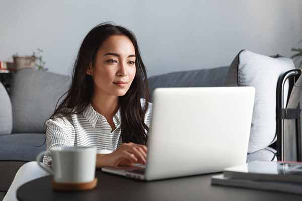Search to Hire the Right HVAC Contractor | Image of Lady on Laptop Search to Hire the Right HVAC Contractor | Image of Lady on Laptop