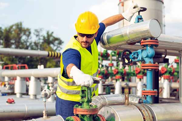 U.S. Pipelines Rules in Place Worker Turning Valve