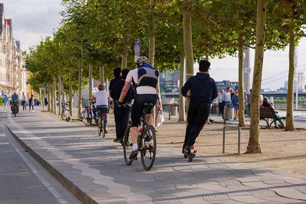 EV Program People in Park Jogging and on Bikes
