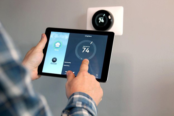 High Electric Bills Man Takes Temperature Reading