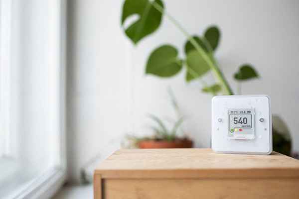 Air Purifier Stis on Desk Designed for Air Improvement