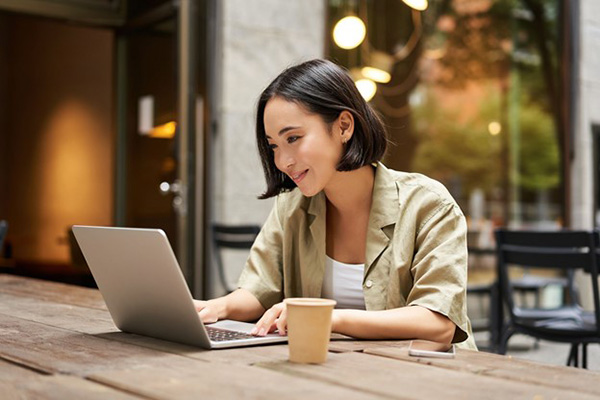 Electricity match.com Woman Checks Rates on Site