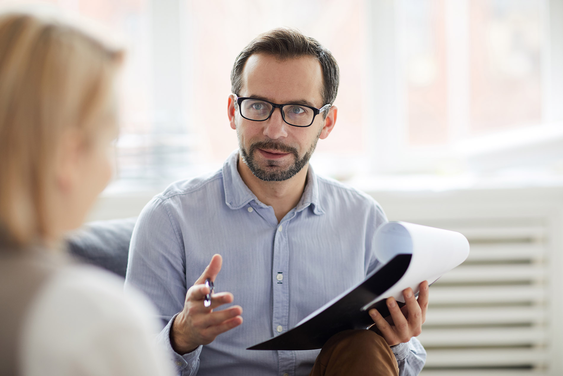 EnergyBot.com Image of Worker Explaining Rates