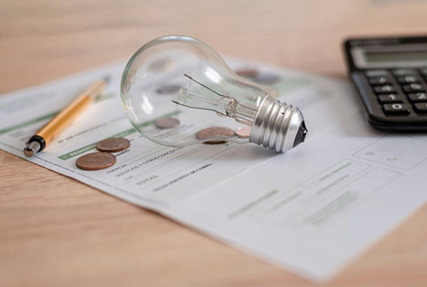 EnergySavings.com vs. EnergyBot | A Price Comparison Photo Illustration EnergySavings.com vs. EnergyBot | A Price Comparison Photo Illustration