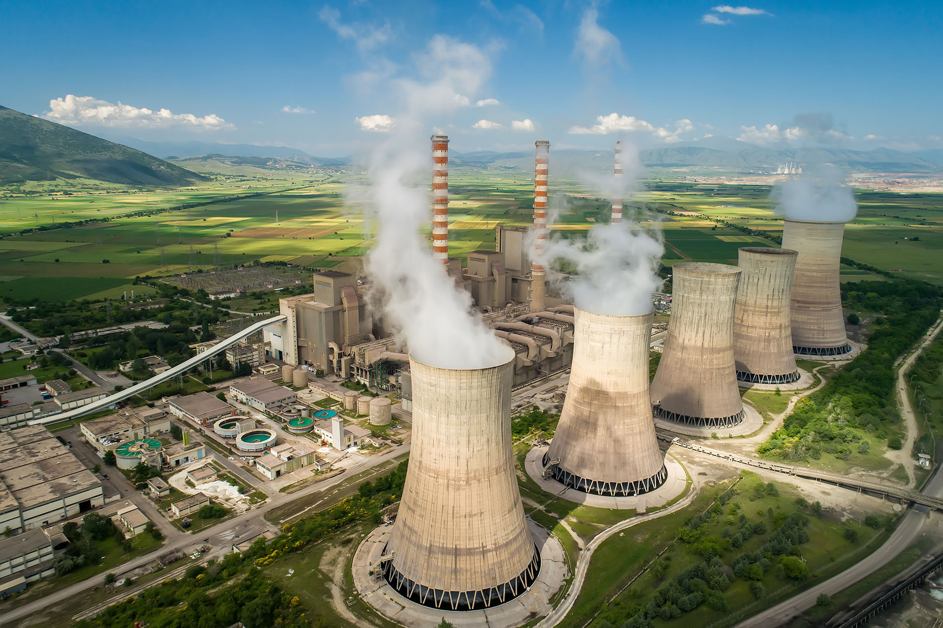 Aerial view the plant producing electrical energy with large pip