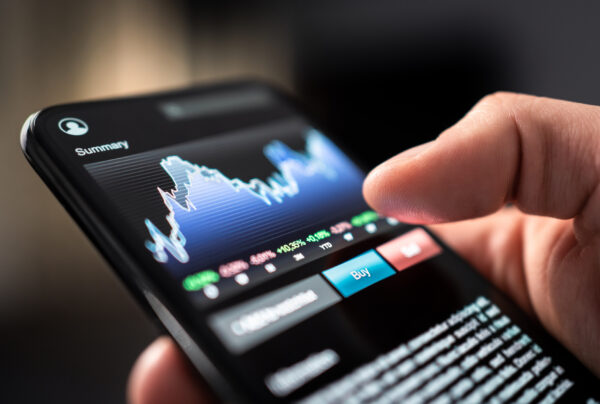 blockchain and energy - man takes measurements on phone