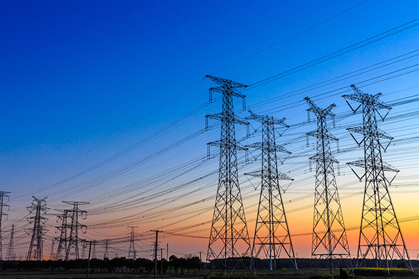 how does ercot manage the grid evening powerlines